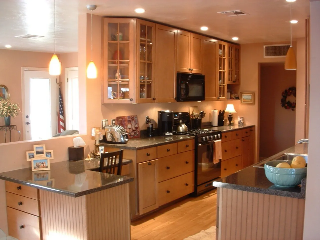 galley kitchen open to family room